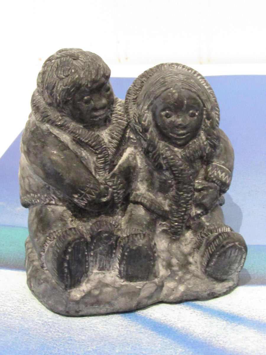 Vintage WE The Wolf Sculptures Eskimo in Canoe OR Eskimo Man and