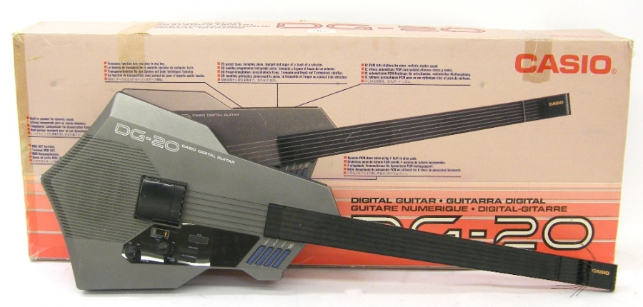 Casio DG-20 digital guitar, made in Japan, with original box