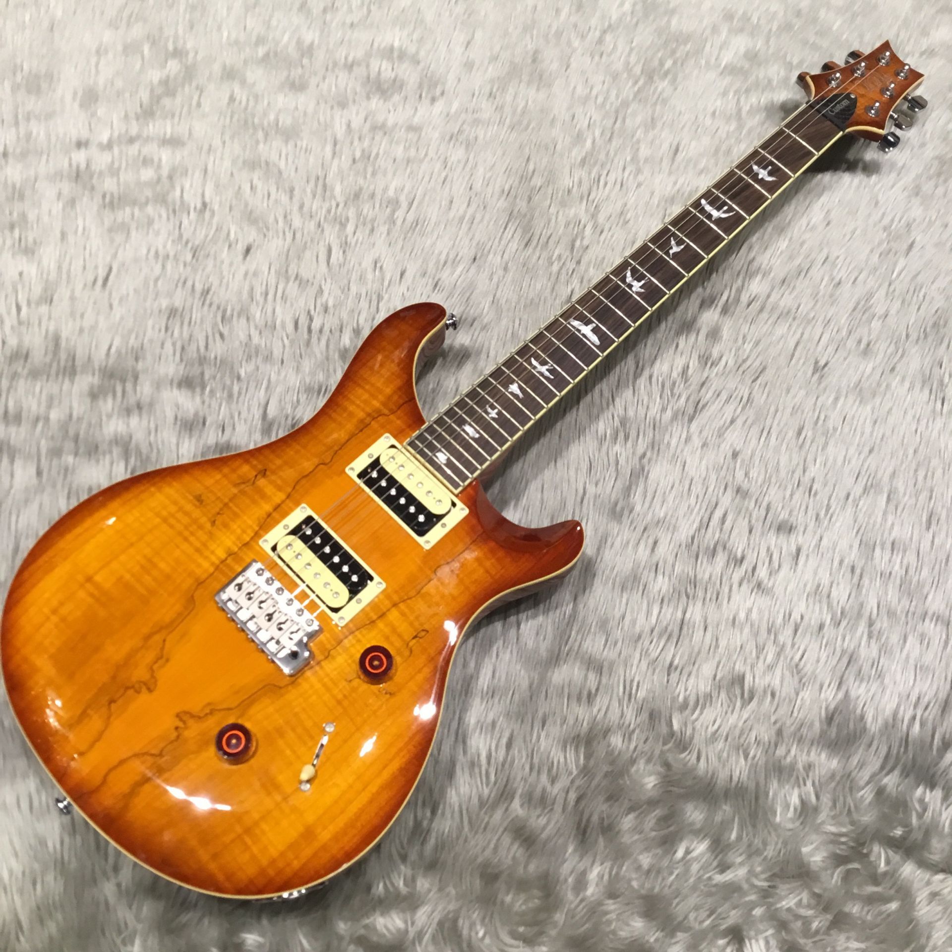新入荷情報】中古 PRS SE CUSTOM 24 のスポルテッドメイプルトップ仕様