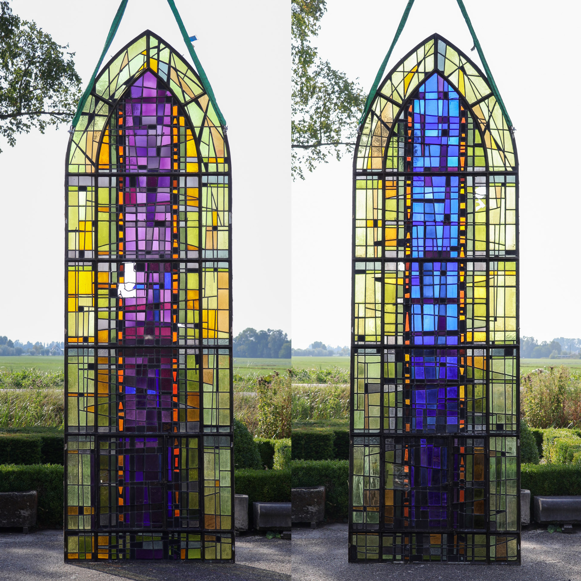 A pair of Gothic-inspired stained glass windows in Brutalist style