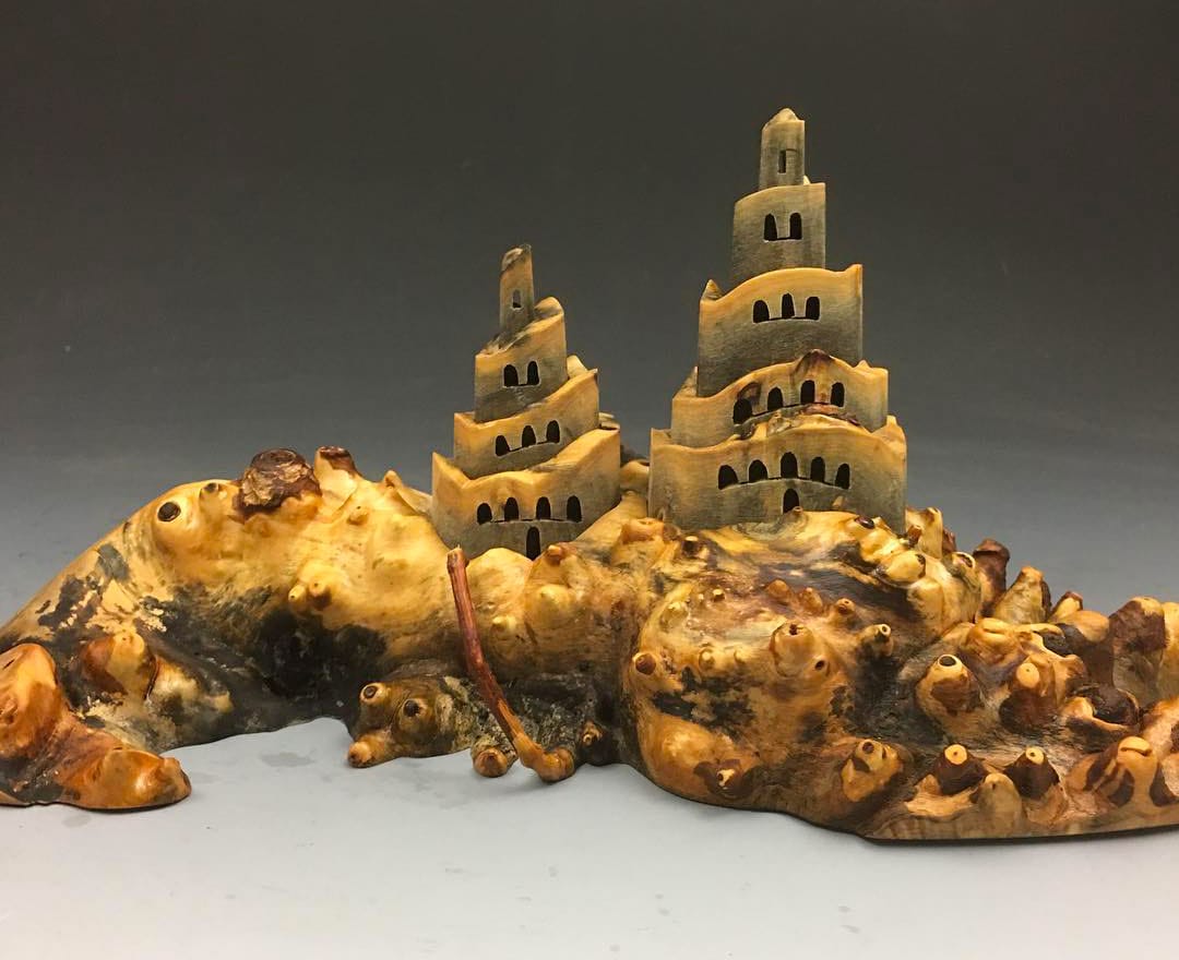 Miniature Castles Emerge from Burled Wood in Carved Kinetic