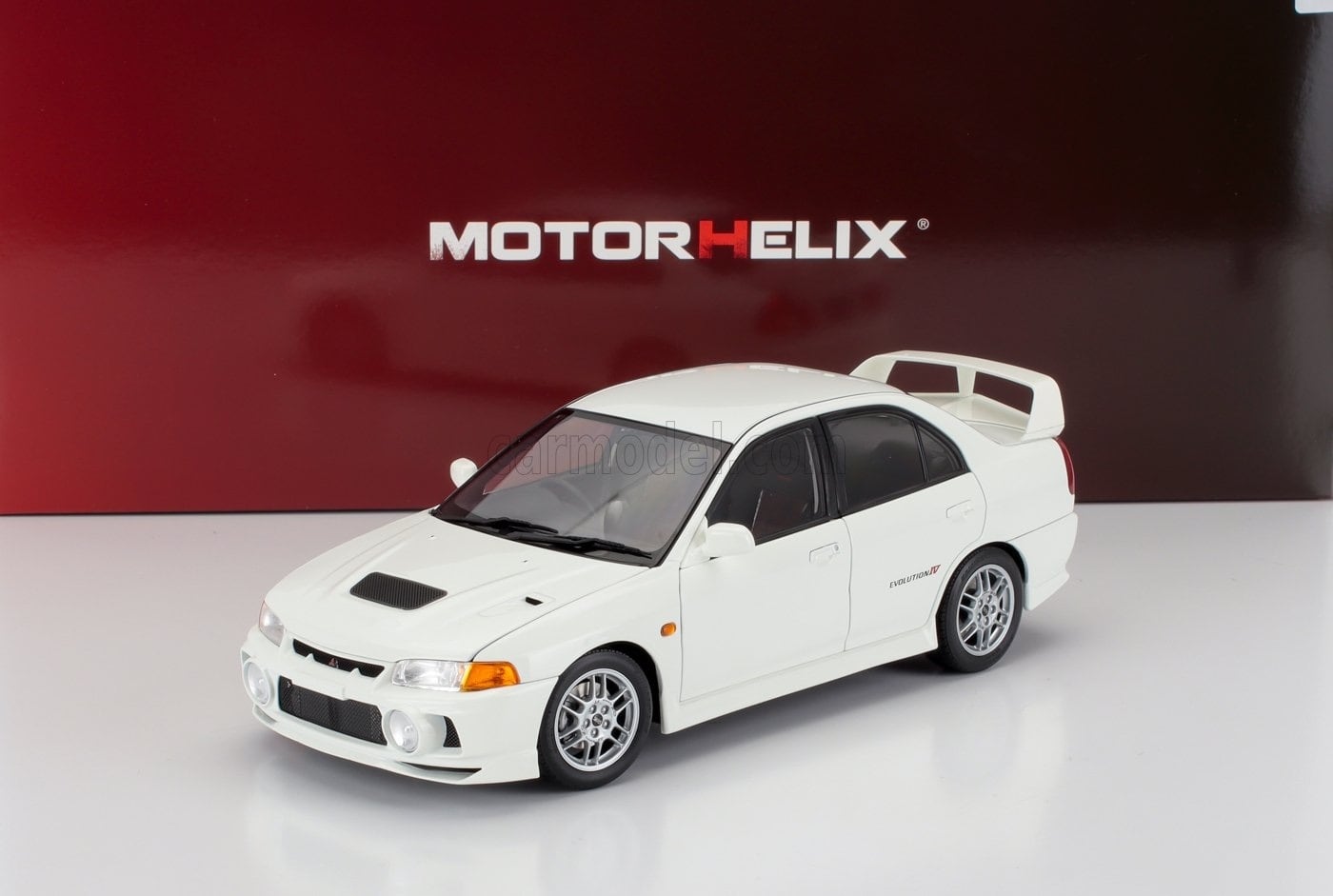 ミニカー 1/18 三菱 ランサー EVO MOTORHELIX 1/18 MITSUBISHI LANCER