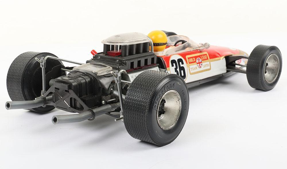 Original Junior Products (Japan) tinplate battery operated Lotus