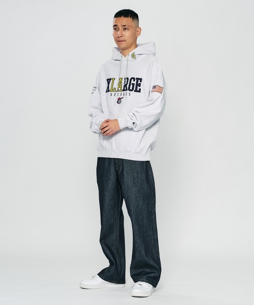 XLARGE（エクストララージ）の「XL LABEL SOUVENIR HOODED SWEAT