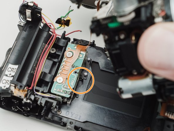 Pentax ZX-5n Mirror Drive Lever Replacement - iFixit Repair Guide