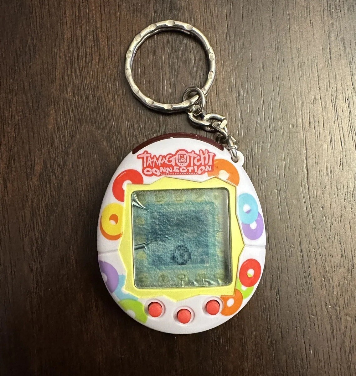 Tamagotchi Connection V2 2004 White With Colorful Donut Shapes