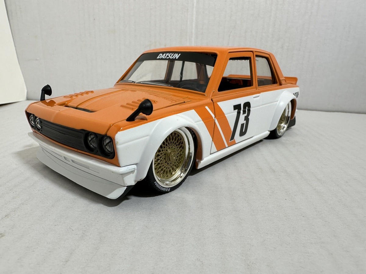 JADA JDM TUNERS 1973 DATSUN 510 ORANGE 1:24 DIECAST MODEL CAR NEW