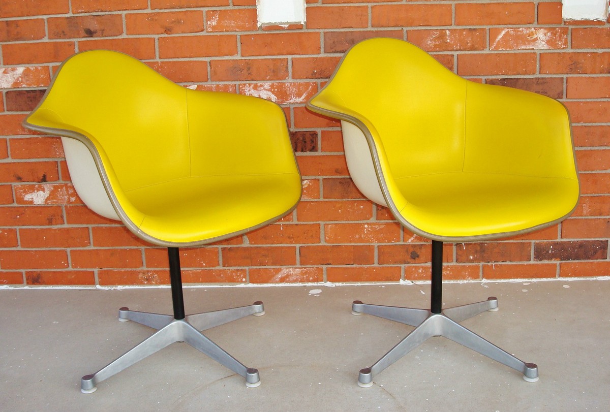Pair EAMES / HERMAN MILLER Cushioned Naugahyde Molded Fiberglass