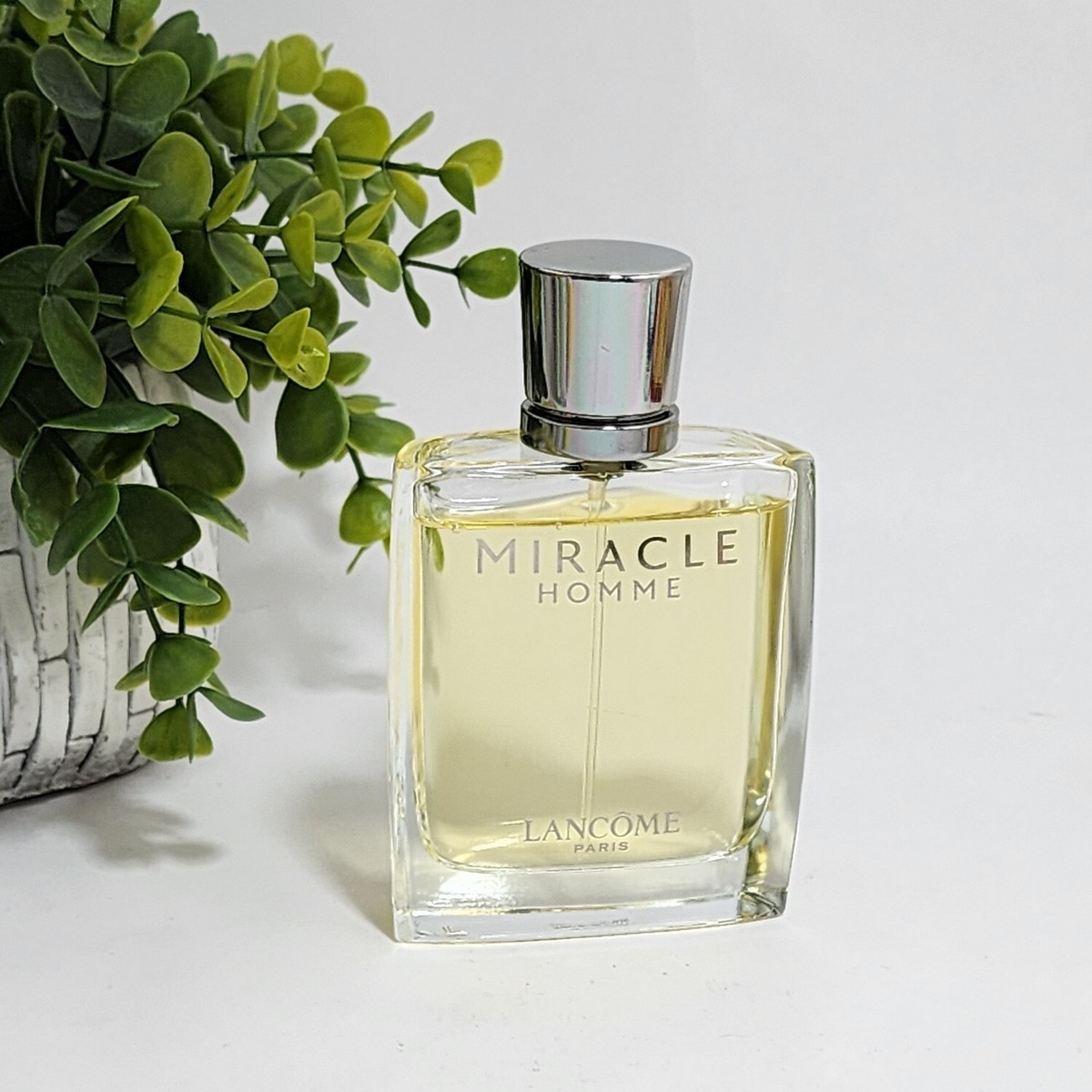 Miracle Homme Eau de Toilette Spray 1.7 fl oz / 50 mL for Men by