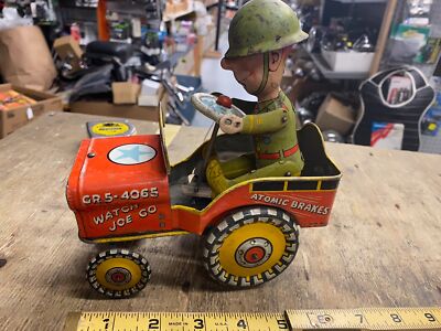 Vtg 1944 GI Joe Jouncing Jeep Wind Up Tin toy WW2 Litho Unique Art