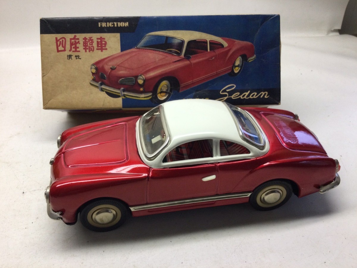 Vintage VW Karmann GHIA - Red/White Sedan Tin Friction Car MF 743