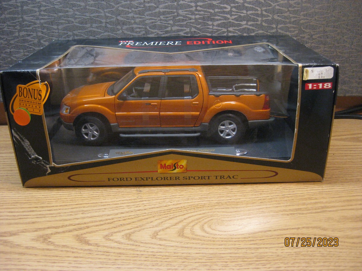 1/18 2002 FORD EXPLORER SPORT TRAC IN GOLD BY MAISTO # 36891 | eBay