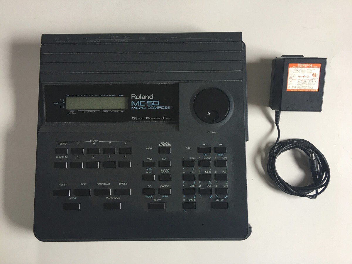 ROLAND MC-50 MICRO COMPOSER + 23 2DD FLOPPY DISKS + 3 MANUALS +