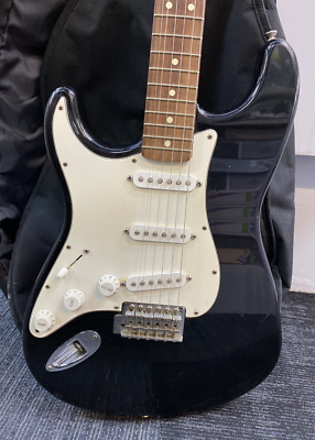 1999 Fender Stratocaster Six String Electric Guitar - Black
