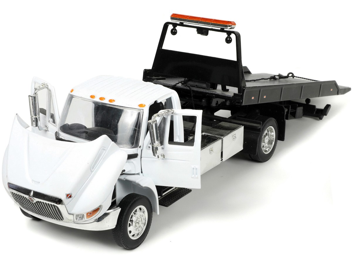 INTERNATIONAL DURASTAR 4400 FLATBED TOW TRUCK WHITE 1/24 DIECAST