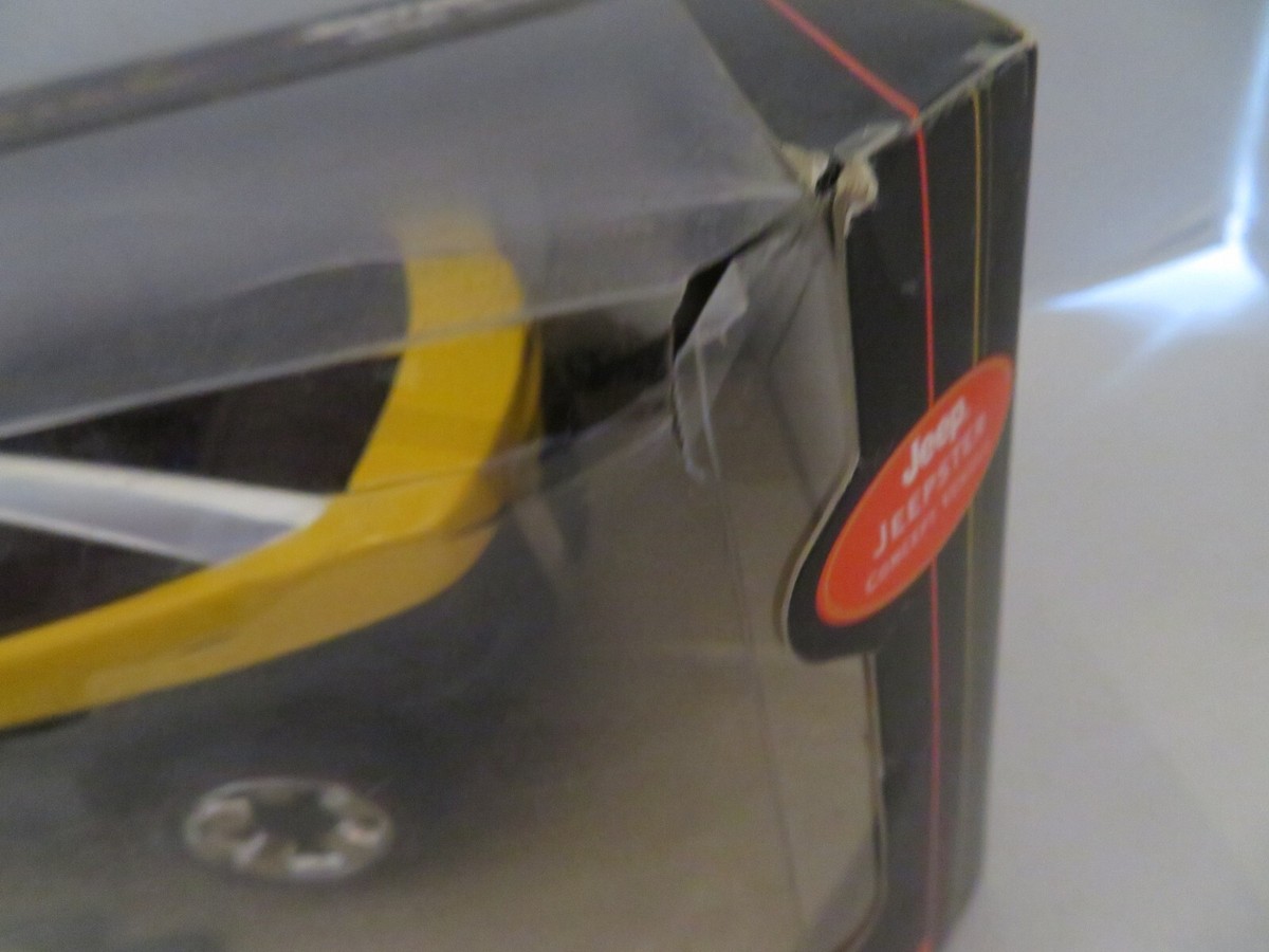 Matchbox Collectibles Yellow Jeep Jeepster Concept 1/18 Diecast