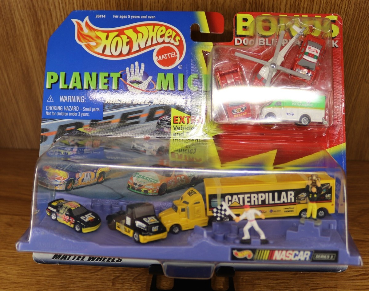 Hot Wheels Planet Micro NASCAR Series CAT Caterpillar w/ Base
