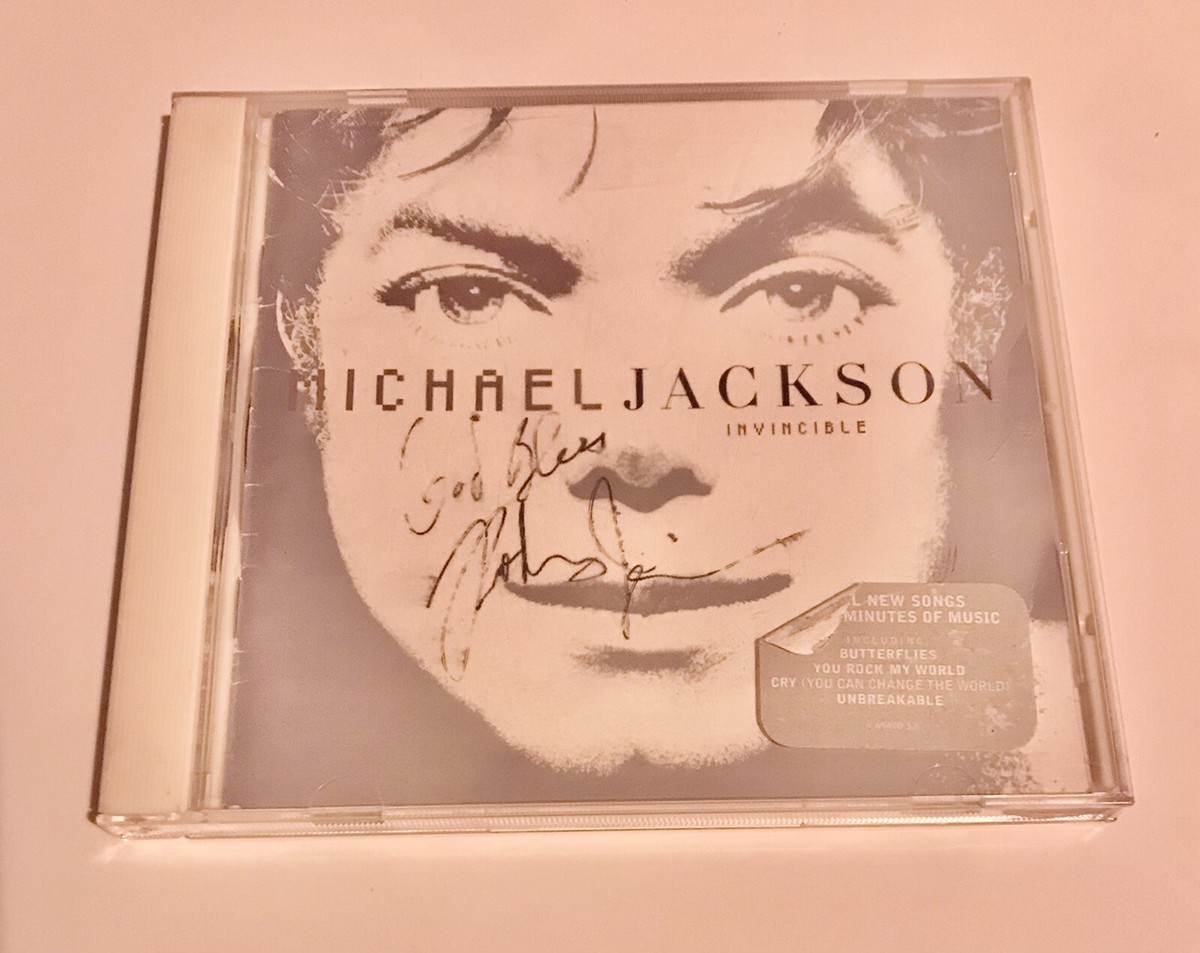 Michael Jackson CD Invincible Autographed by Chris Tucker&Rodney