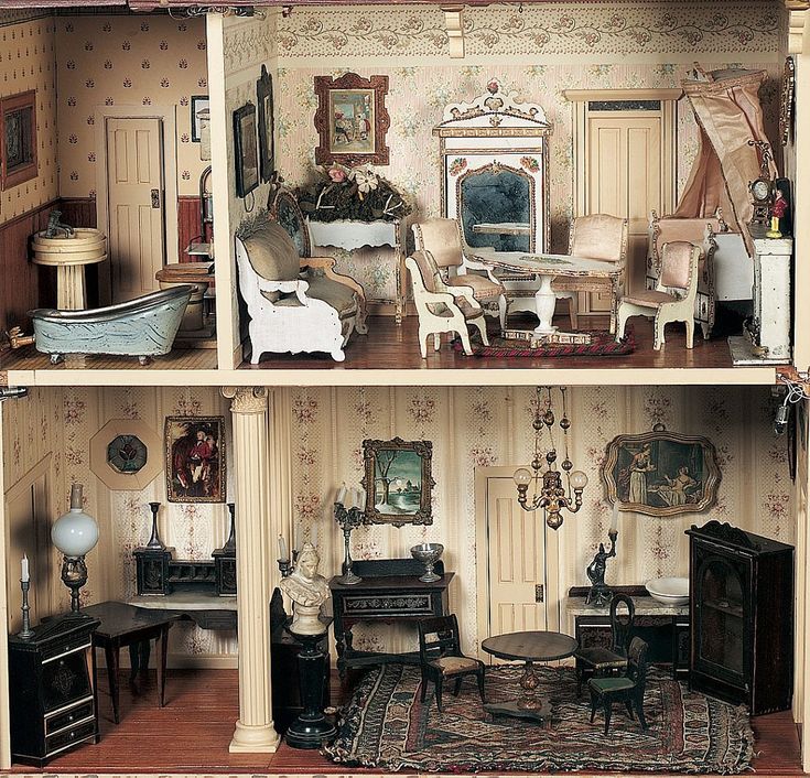A Twelve-Room Dollhouse with Antique Furnishings