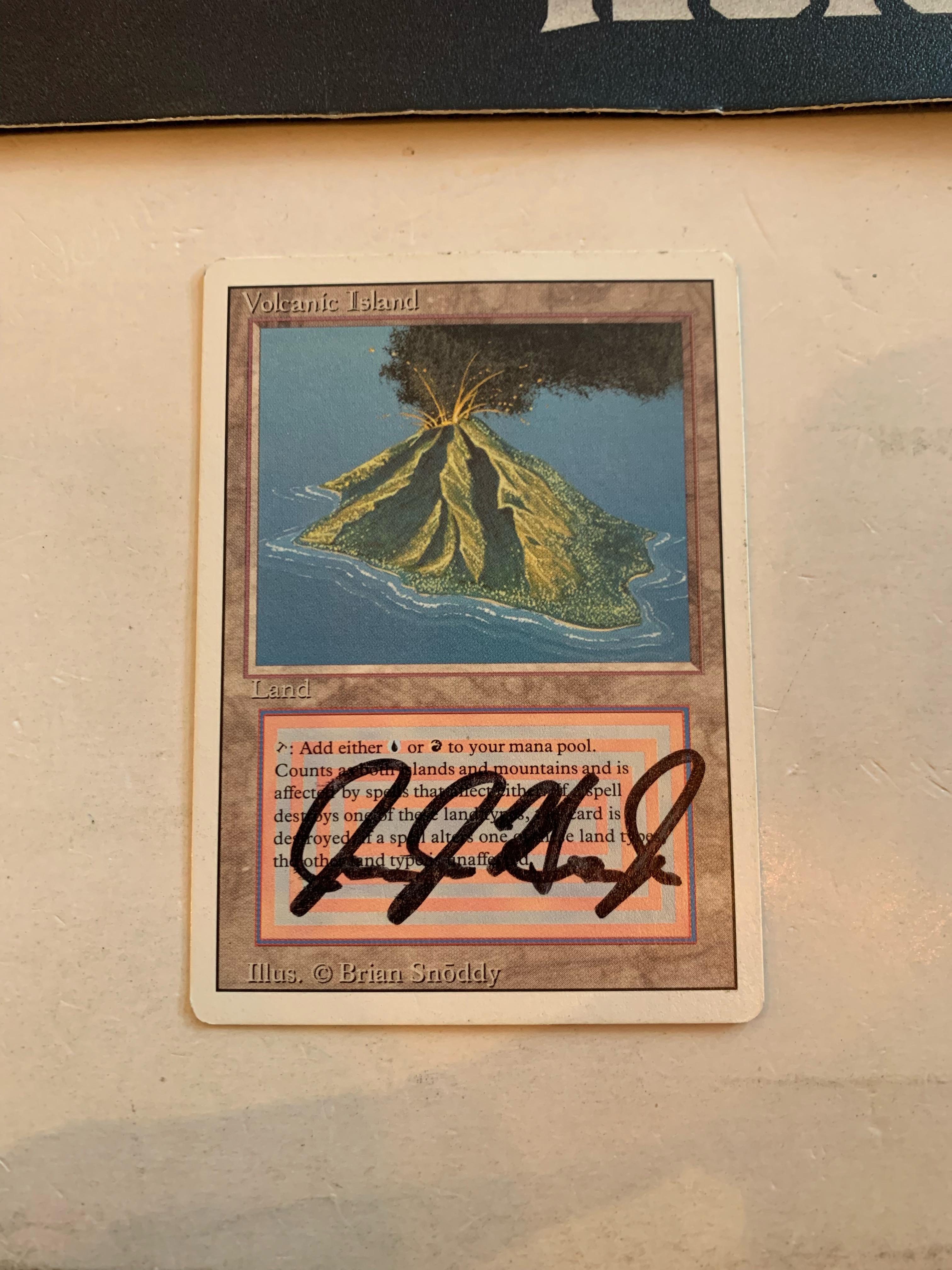 Does anyone know who signed this Volcanic Island? : r/magicTCG