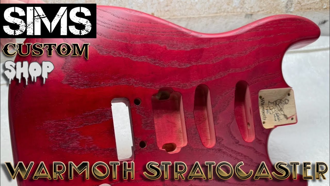 Warmoth Stratocaster - Non grain filled Transparent Red Swamp Ash
