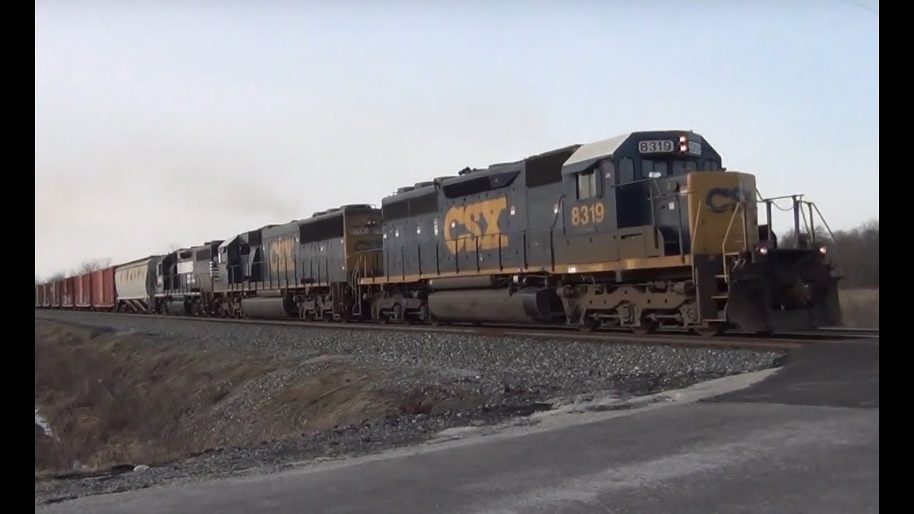 Awesome EMD lashup CSX 8319 SD40-2 SD60 NS GP38AC departs Defiance
