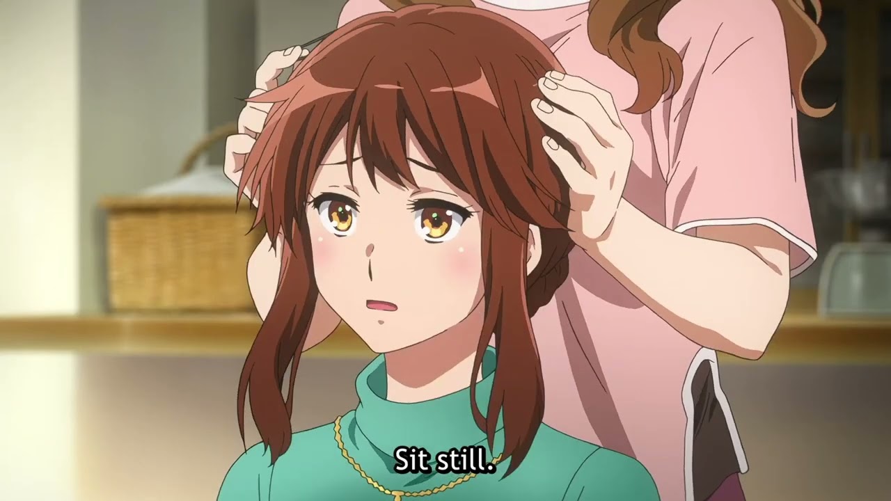 Mamiko is dressing Kumiko up for the concert マミコはクミコを