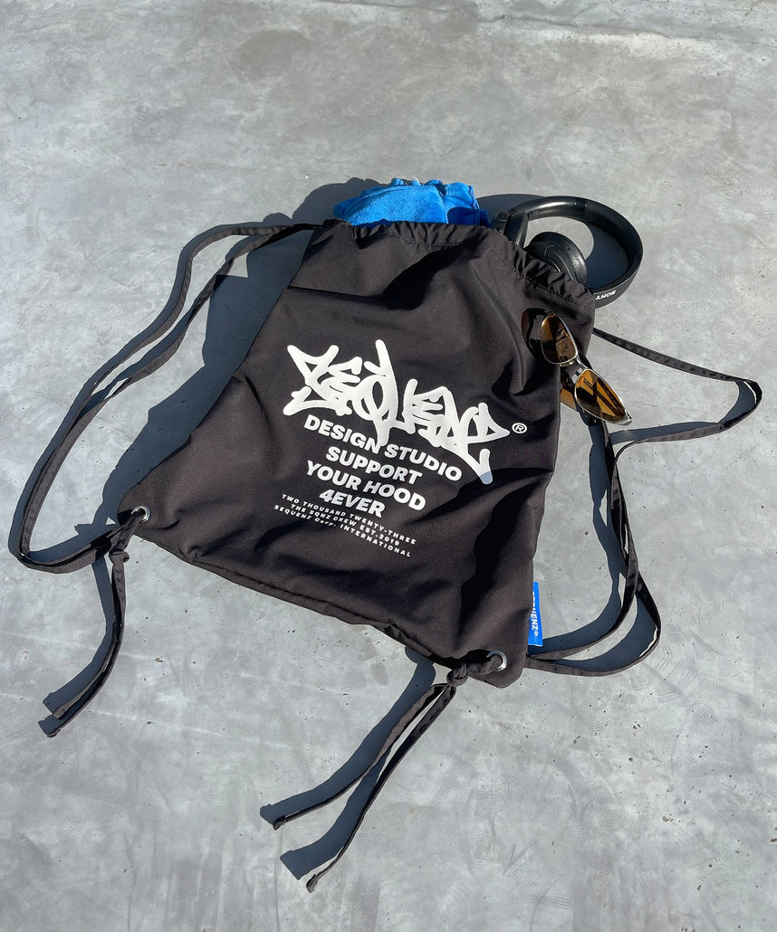 SEQUENZ 2 FACE STRING KNAPSACK / リバーシブル テック ナップサック
