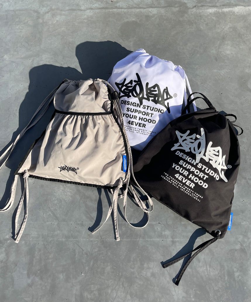 SEQUENZ 2 FACE STRING KNAPSACK / リバーシブル テック ナップサック