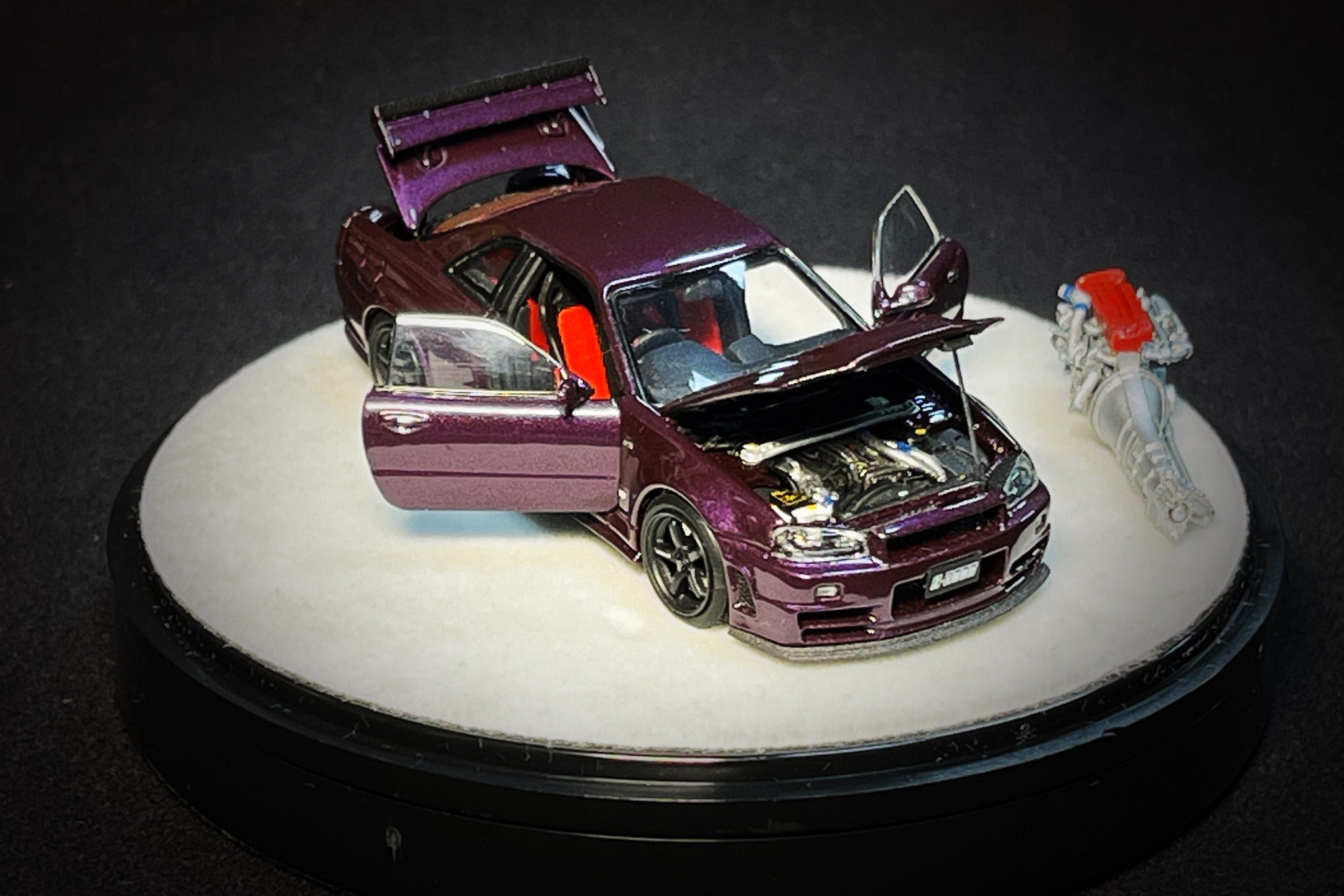 PGM x One Model 1:64 Nissan Skyline GT-R (R34) Z-Tune in Midnight