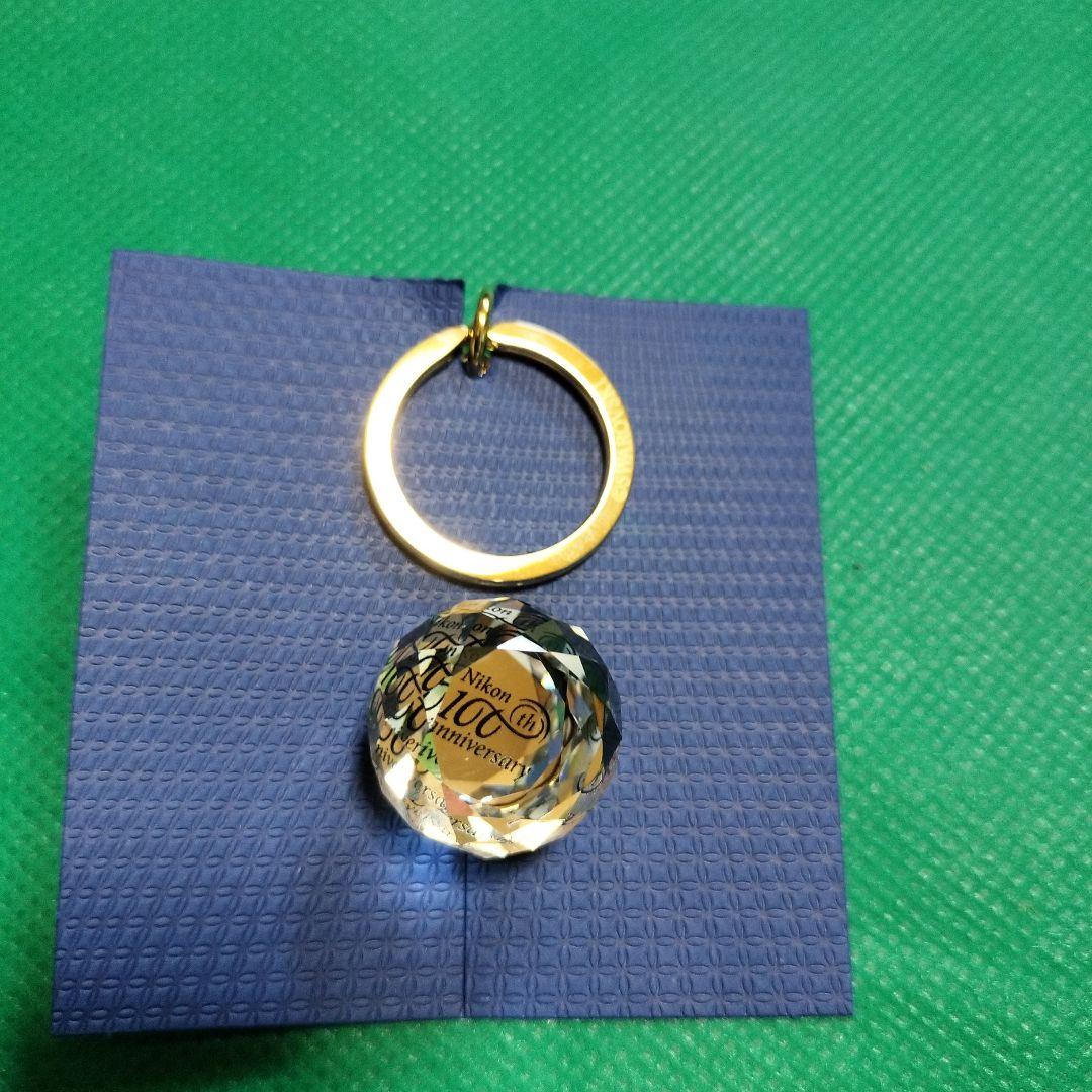 Nikon 100周年記念品 SWAROVSKI キーホルダー - メルカリ