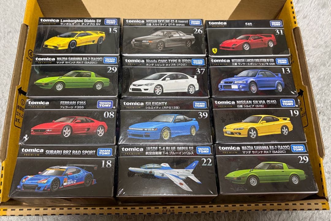 トミカプレミアム 12台セット - メルカリ