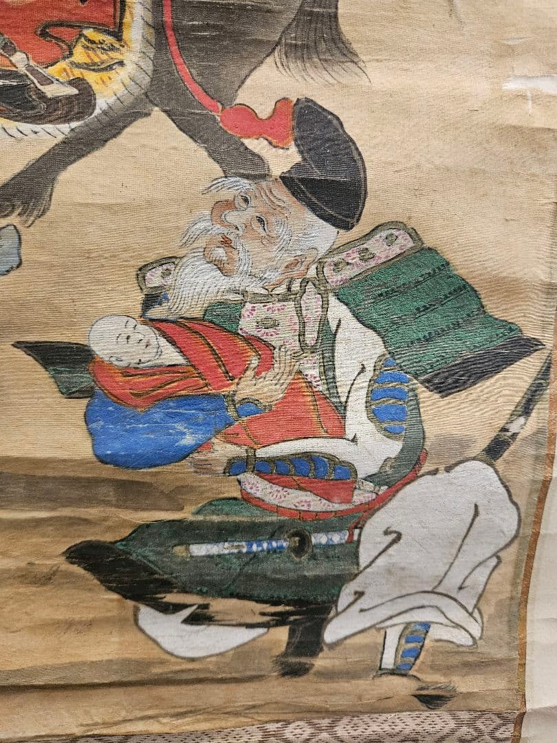 家紋図鑑_鷹の羽 『中輪に足付き違い鷹の羽』大
