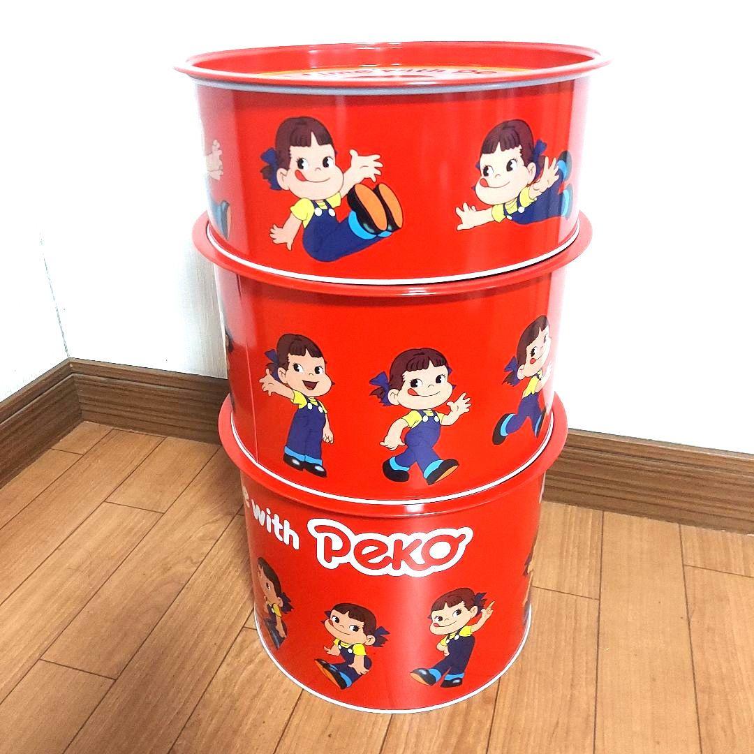 レア】不二家 ペコちゃん 3段缶セット - メルカリ