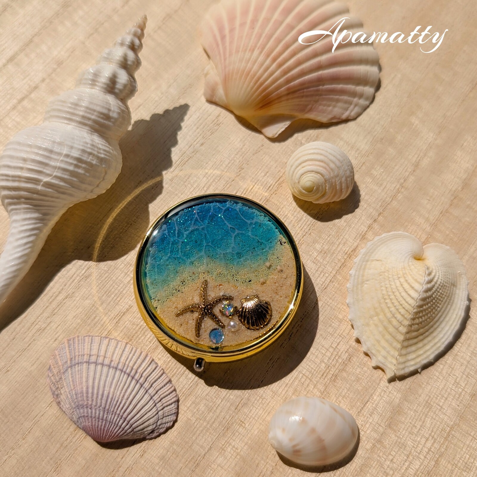 沖縄・石垣島の貝🐚海塗りレジンヘアゴム✨ チャーム付き💕 - Apamatty